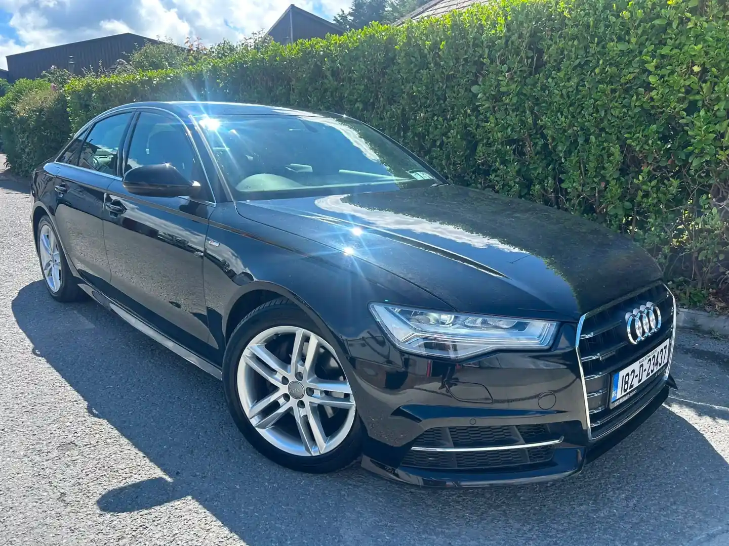 Black Audi A6 S line saloon, side profile, at RS Motors, Clonakilty