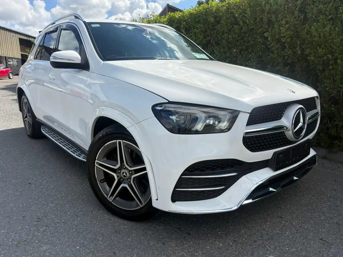 White Mercedes GLE AMG Line, front view with the hedge behind, at RS Motors, Clonakilty