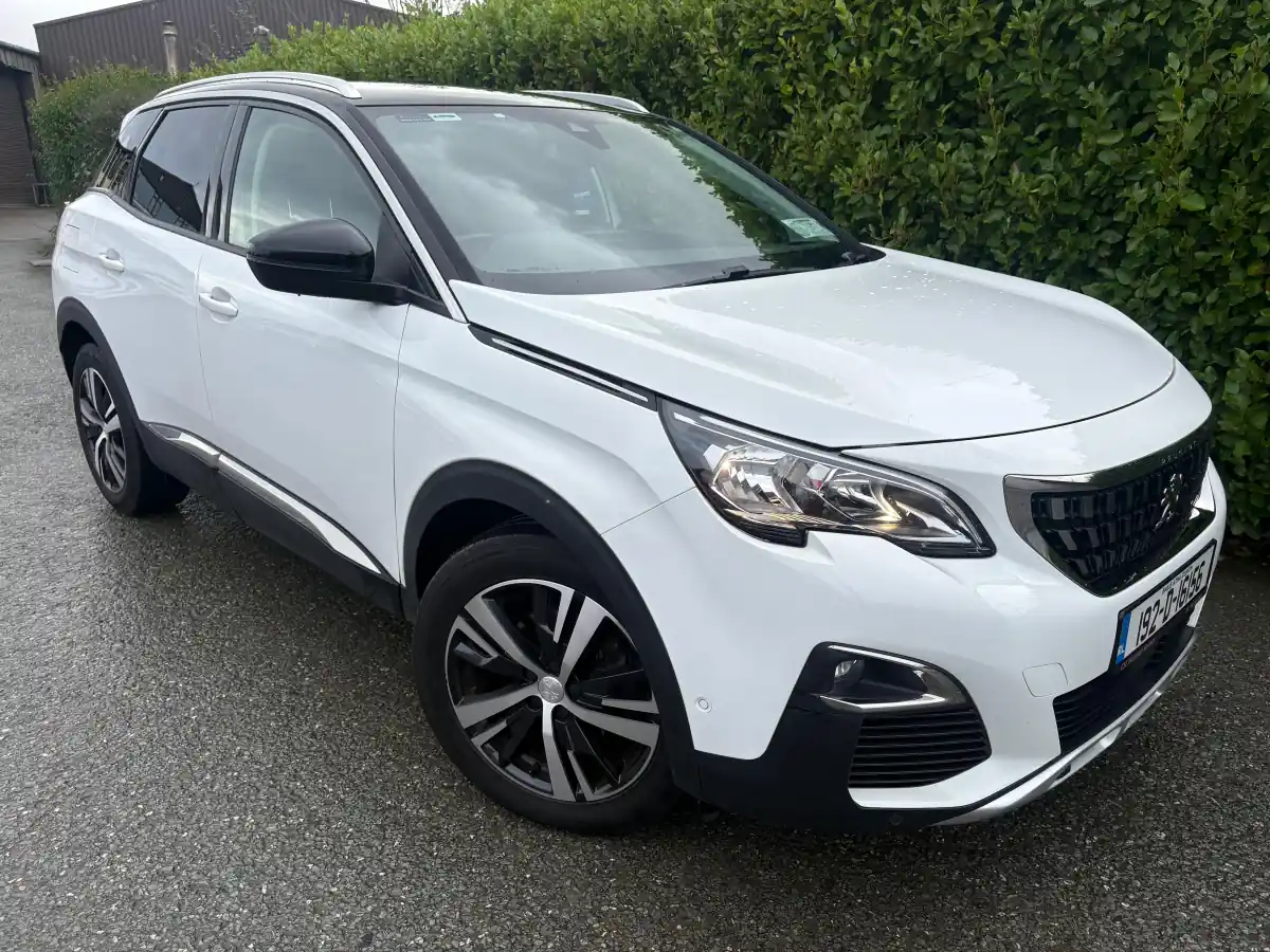 White Peugeot 3008, photographed after rain, at RS Motors, Clonakilty