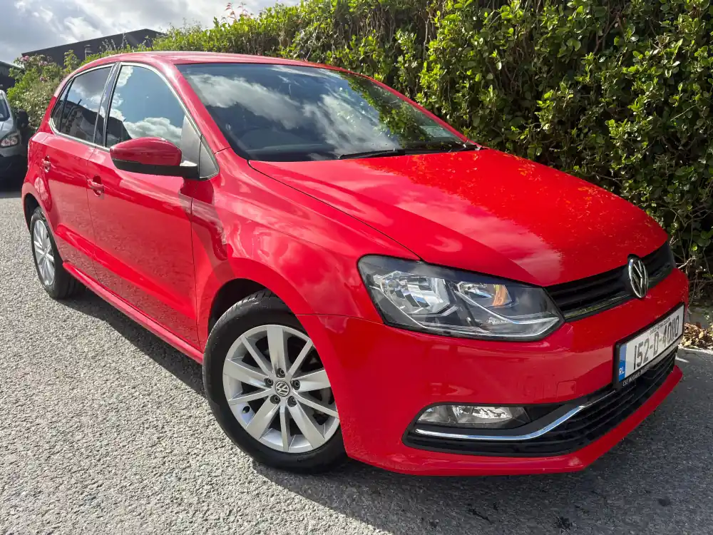 Red Volkswagen Polo hatchback, front three-quarter view, at RS Motors, Clonakilty